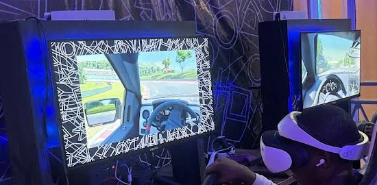 Player One racing display showing driving gameplay.