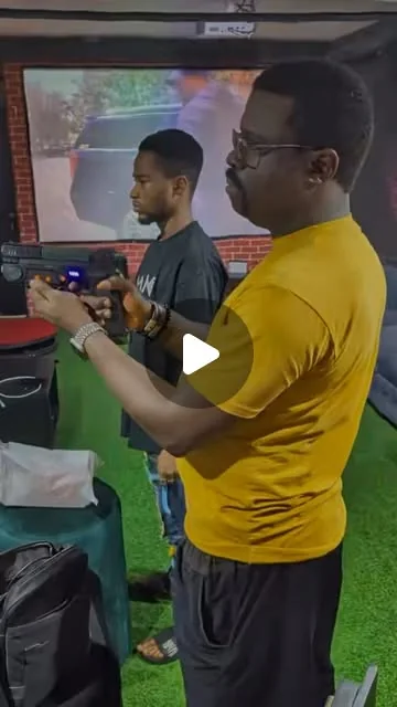 Guests playing light gun arcade shooting games at Player One Game Cafe