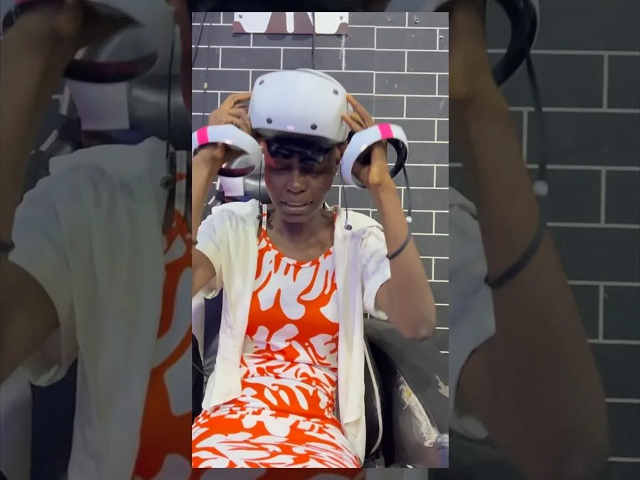 Child trying a supervised virtual reality headset at Player One
