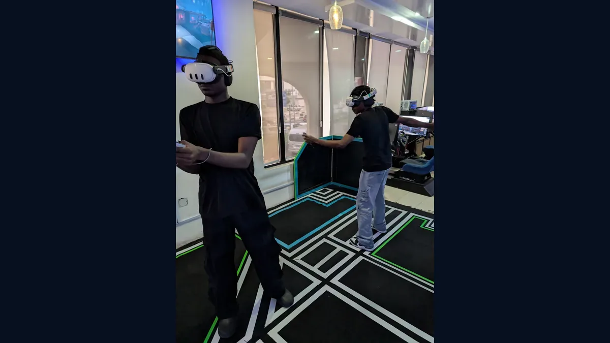 Guests playing free-roam VR Arena at Player One Game Cafe