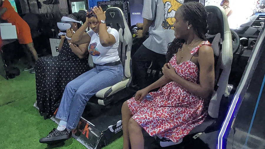 Creator and friends enjoying VR and racing content moments at Player One Game Cafe