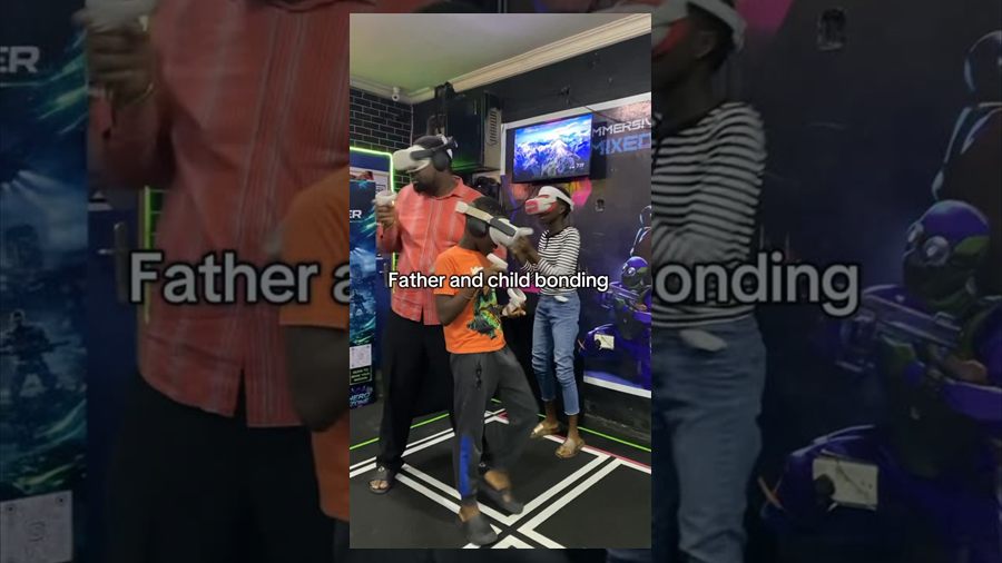 Father and child VR bonding moment at Player One Game Cafe