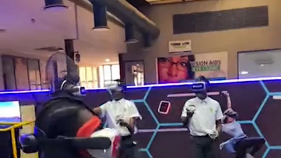 A group watching and sharing a Player One VR arena experience