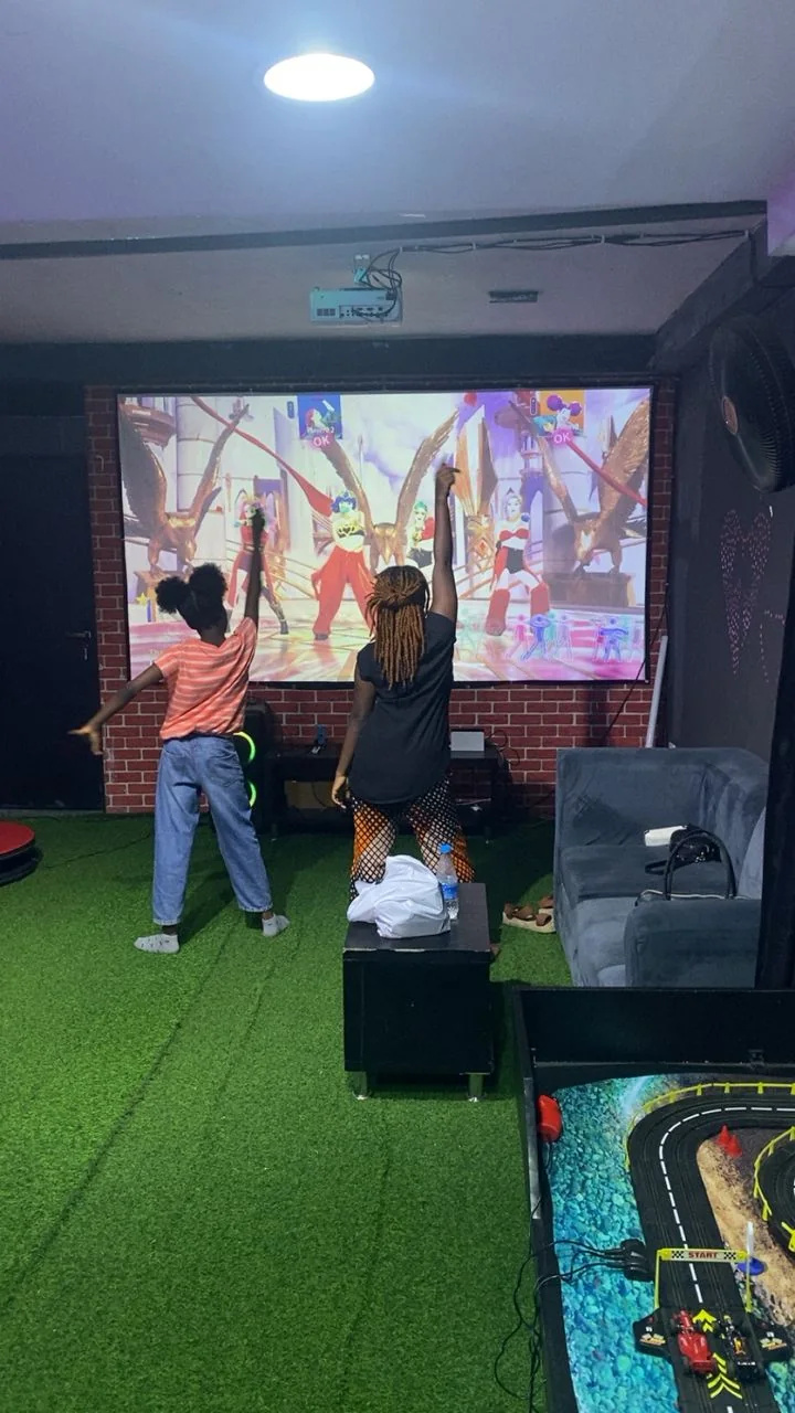 Guests playing Just Dance on Nintendo Switch at Player One Game Cafe