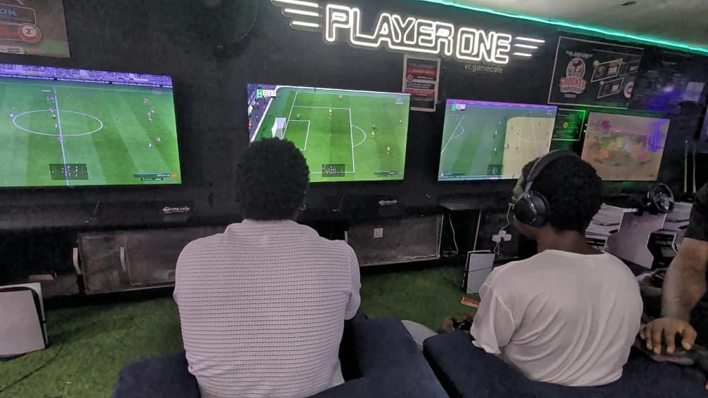 Group FC football battles on PS5 at Player One Game Cafe Lagos